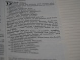 A close-up photograph of a page from a book, showing text that lists names and their roles in a religious or historical context. The page includes formatting with lines to the right side.