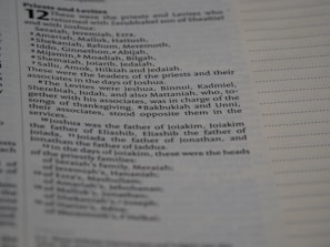A close-up photograph of a page from a book, showing text that lists names and their roles in a religious or historical context. The page includes formatting with lines to the right side.