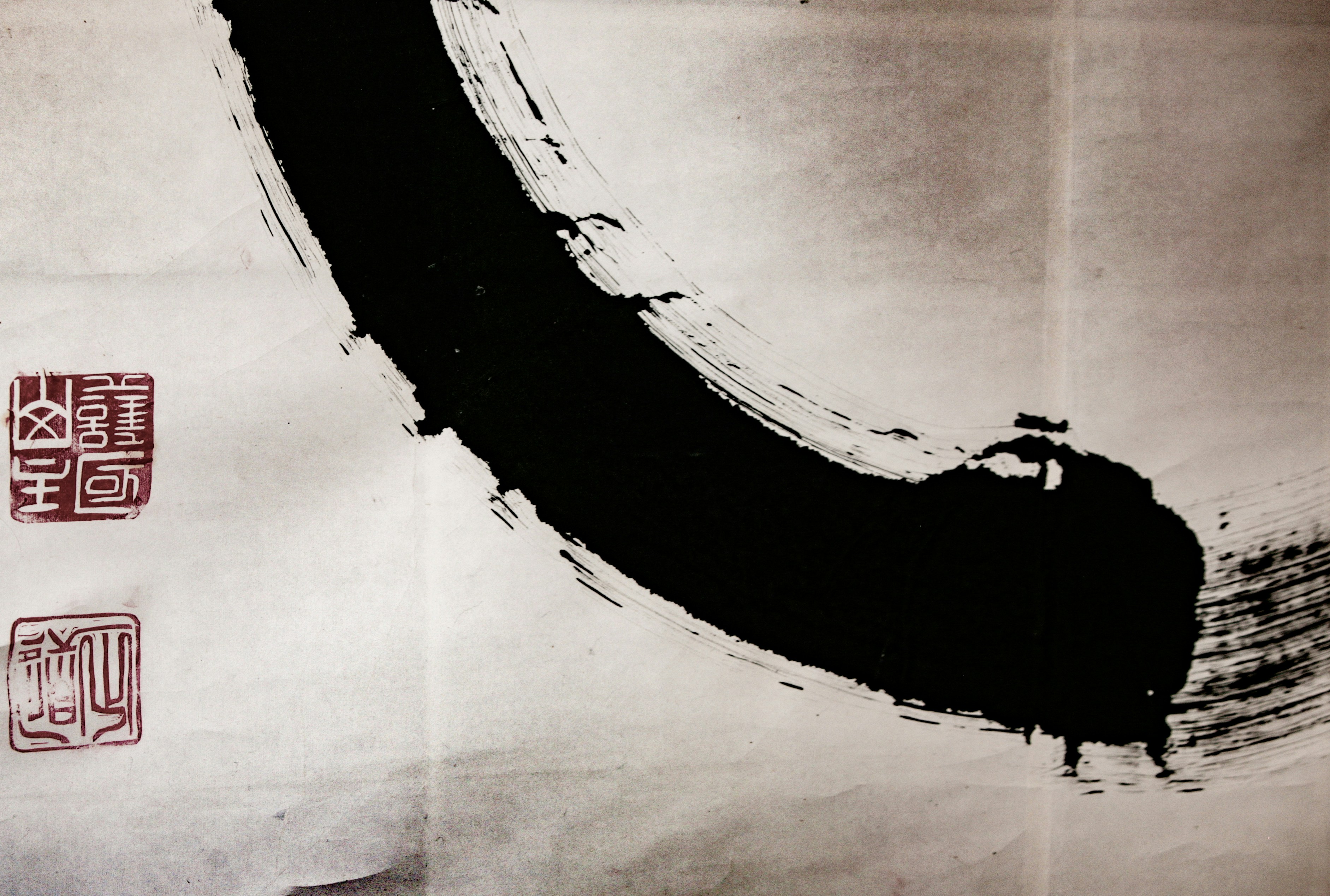 A piece of paper with a black and white painting on it photo – Free ...
