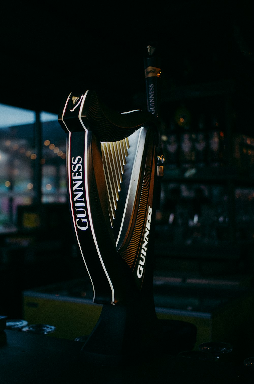 a guinness glass sitting on top of a table