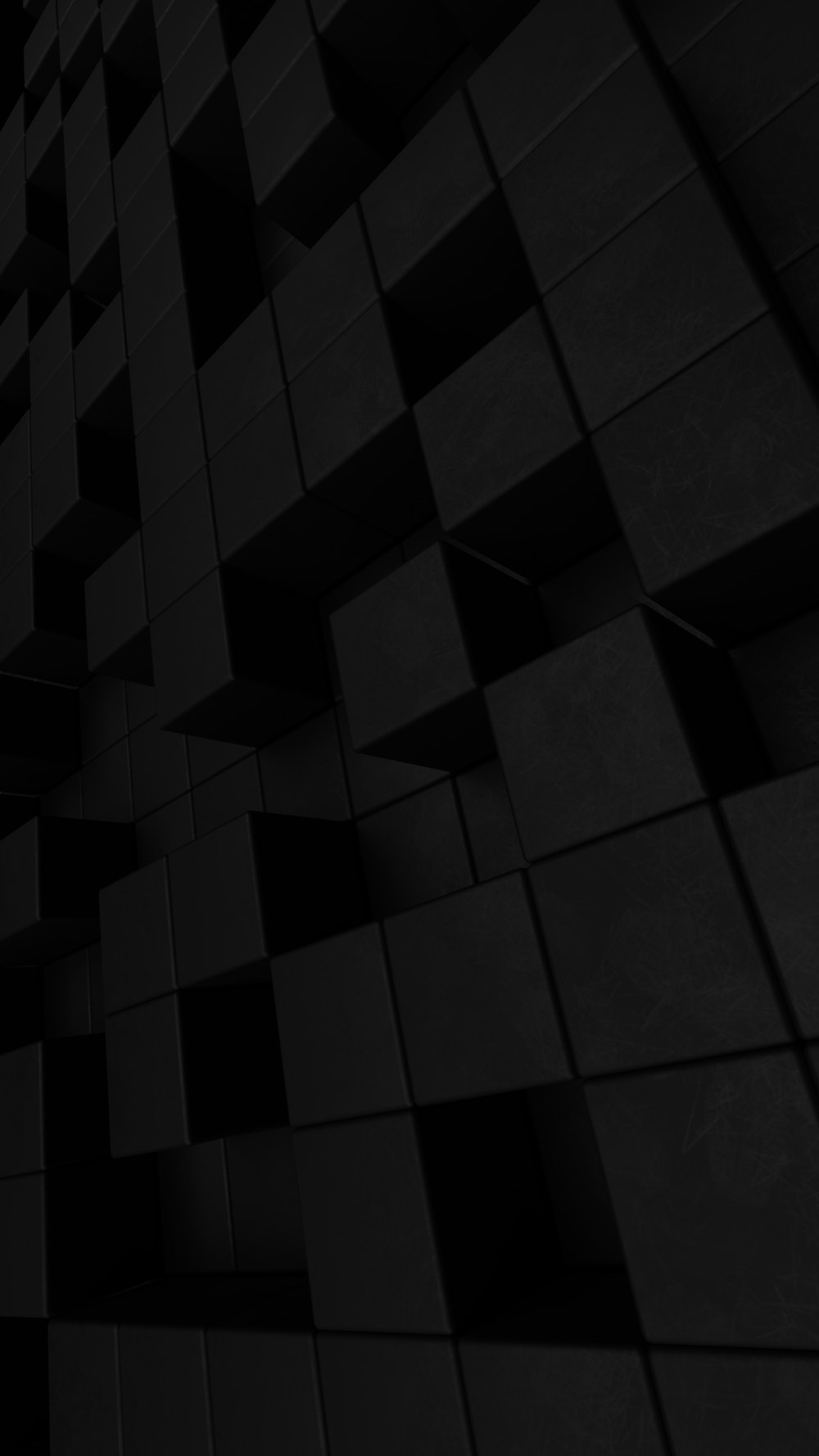 Una foto en blanco y negro de una pared hecha de cubos