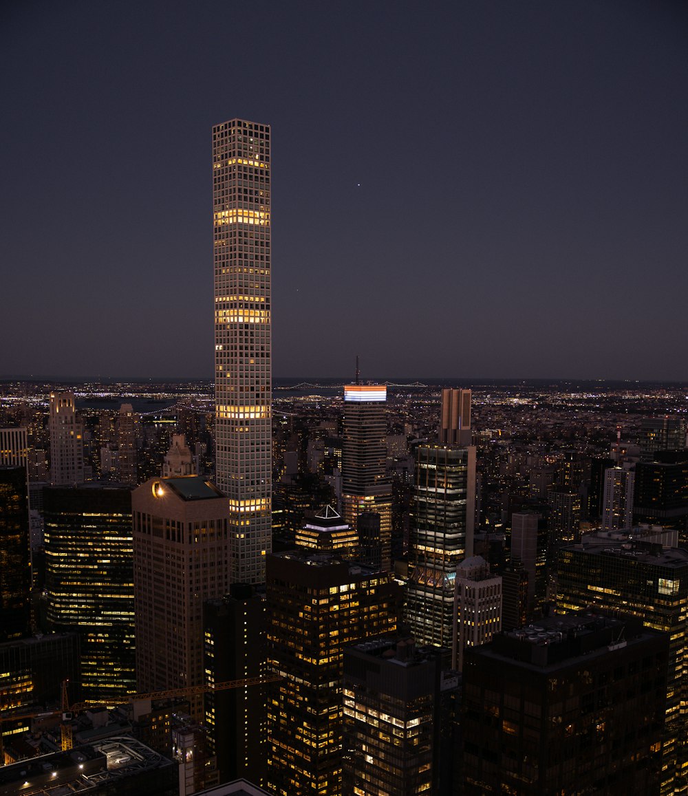 a view of a city at night from the top of a building