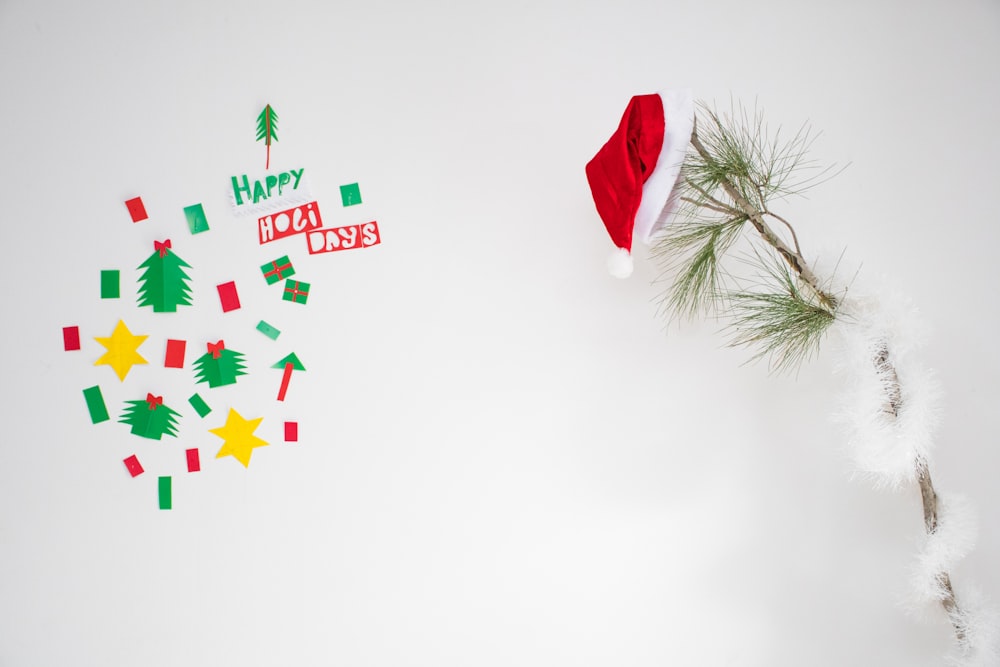 a christmas tree with a santa hat on top of it