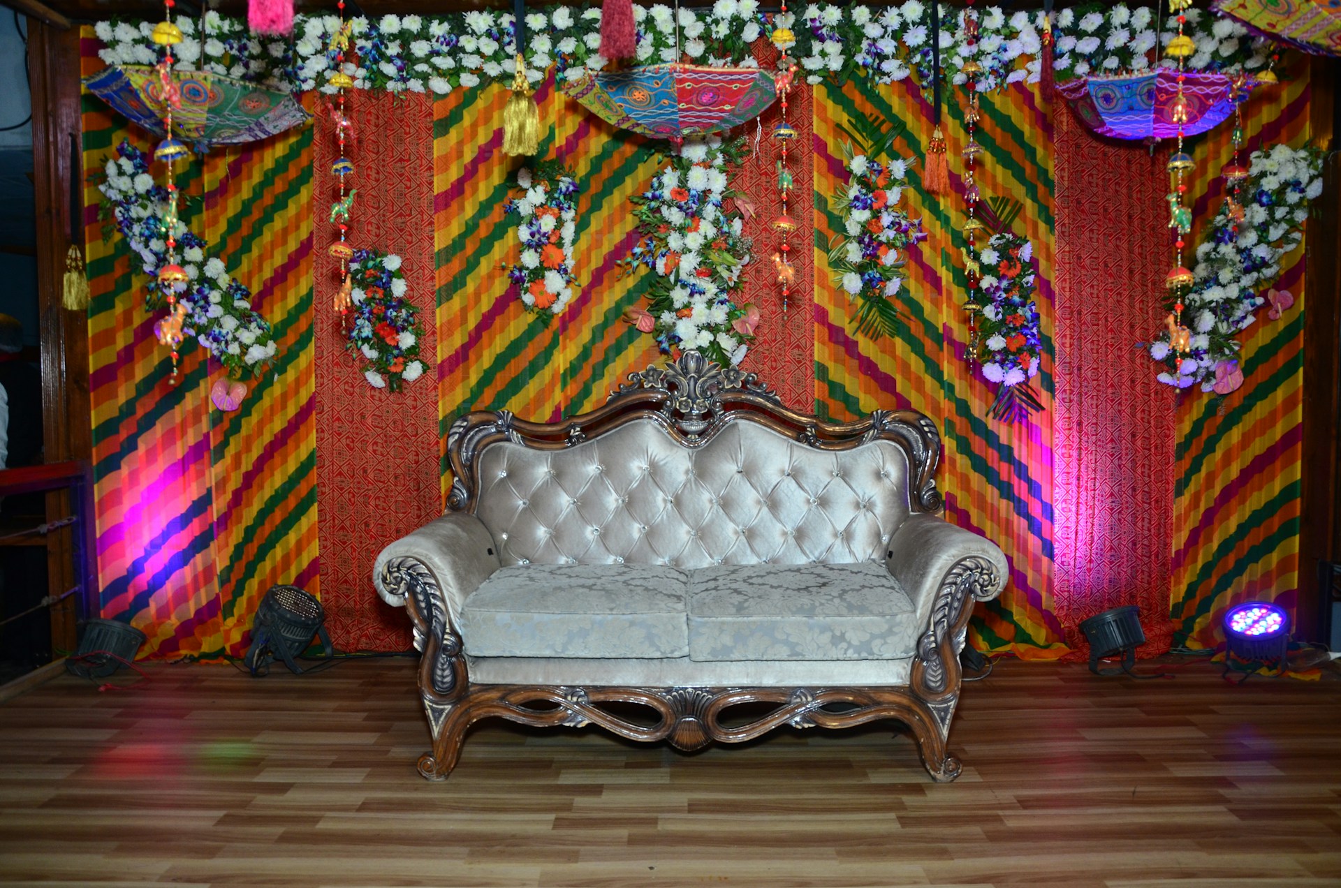 a couch sitting on top of a wooden floor