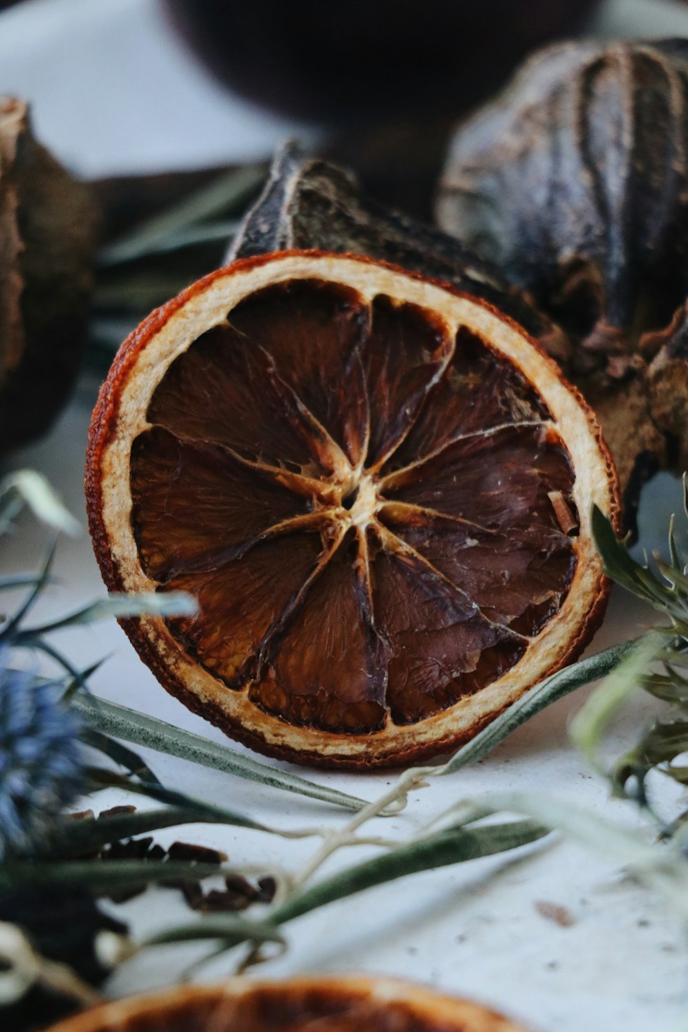 a blood orange cut in half sitting on a table