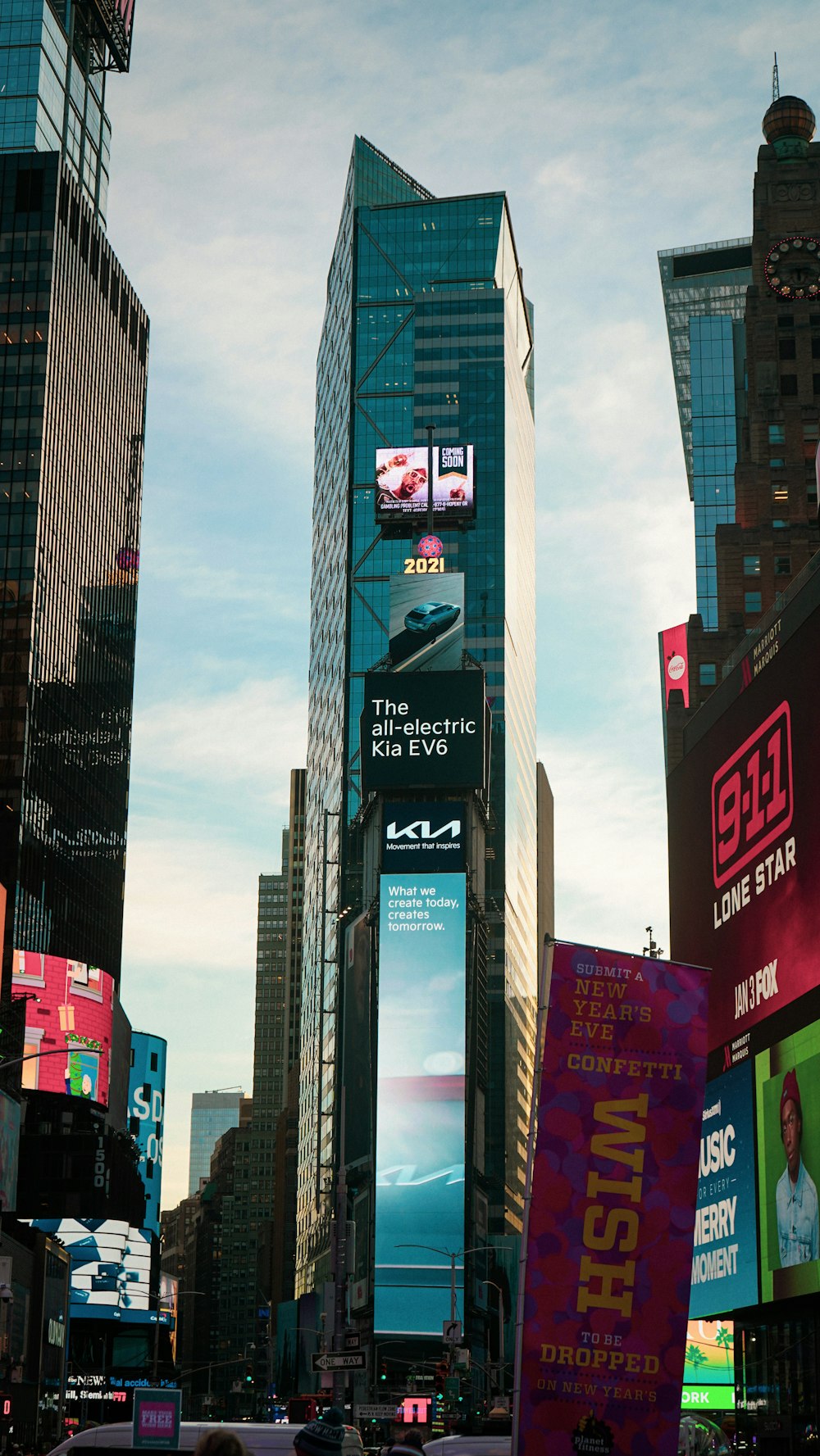 a city street filled with lots of tall buildings