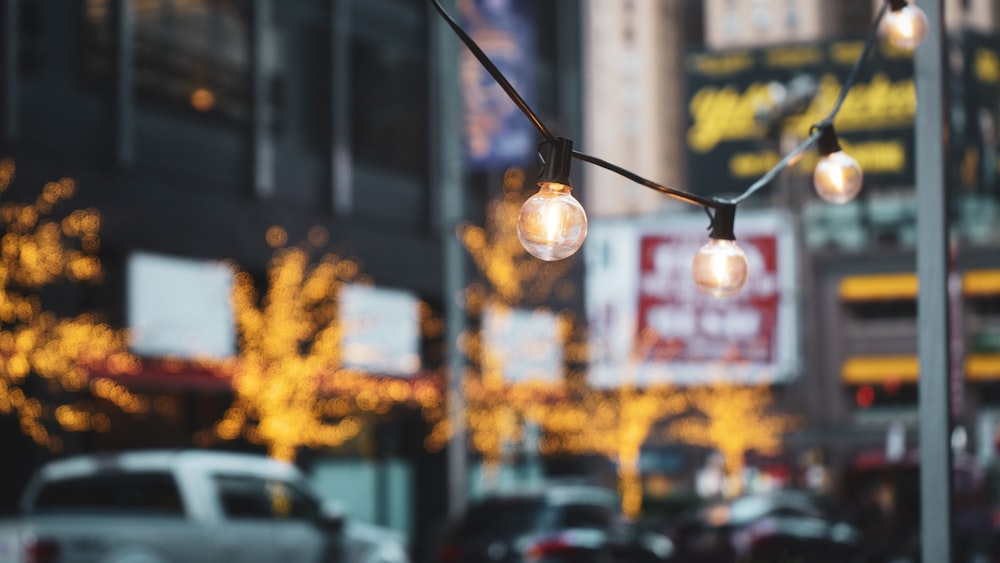 a bunch of lights that are on a pole