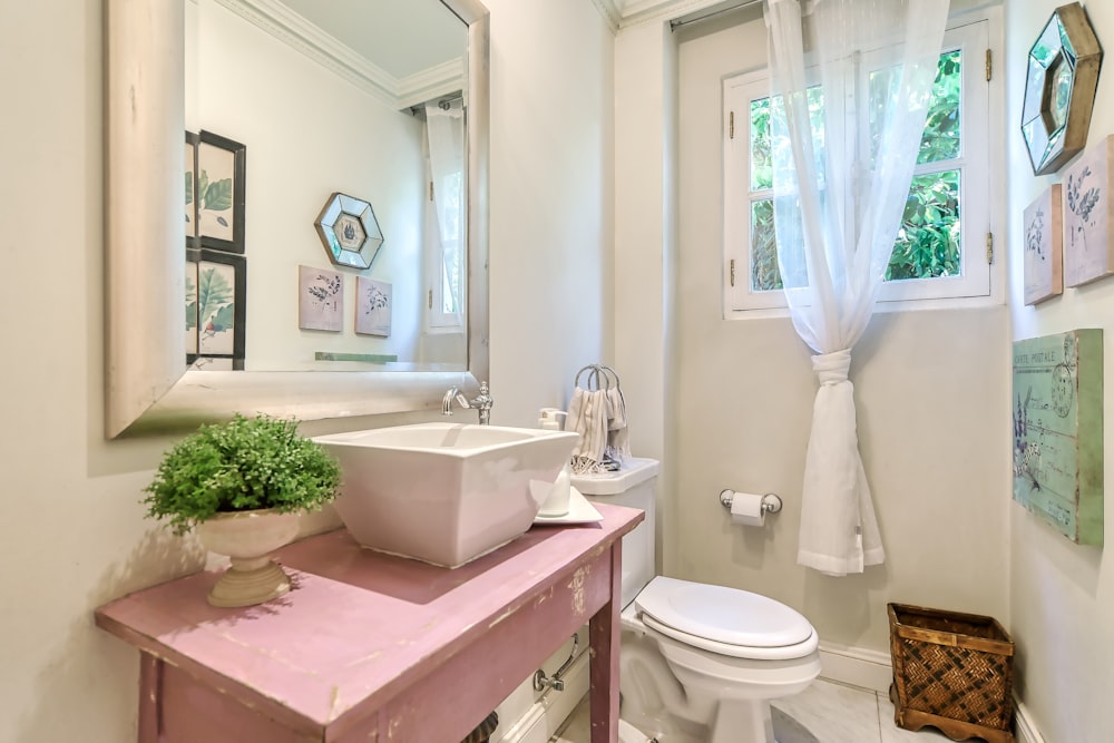 a bathroom with a sink and a toilet