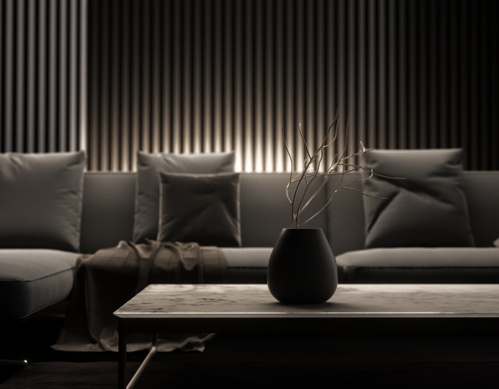 Low-lit sitting room with a linen sofa