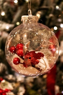 a christmas ornament hanging from a christmas tree