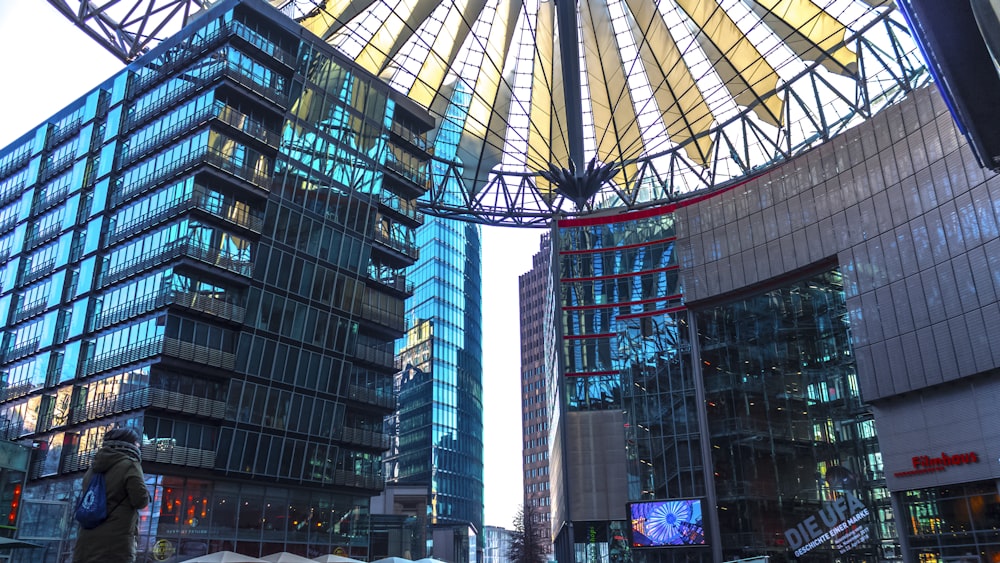 a view of a city street with tall buildings in the background