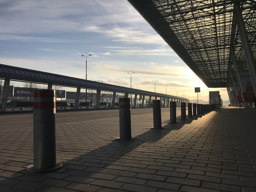 a train station with a train on the tracks