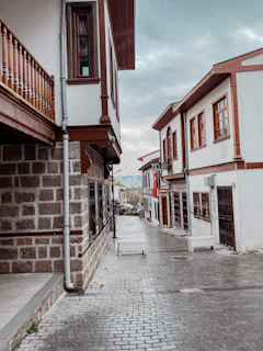 a cobblestone street in a small town