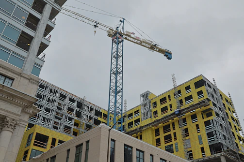 a crane that is on top of a building
