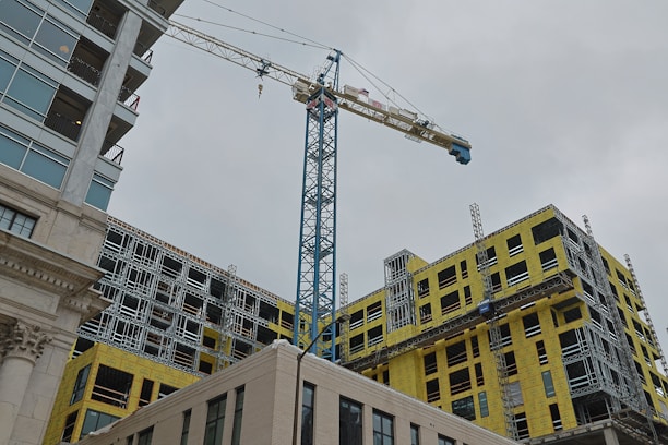 a crane that is on top of a building