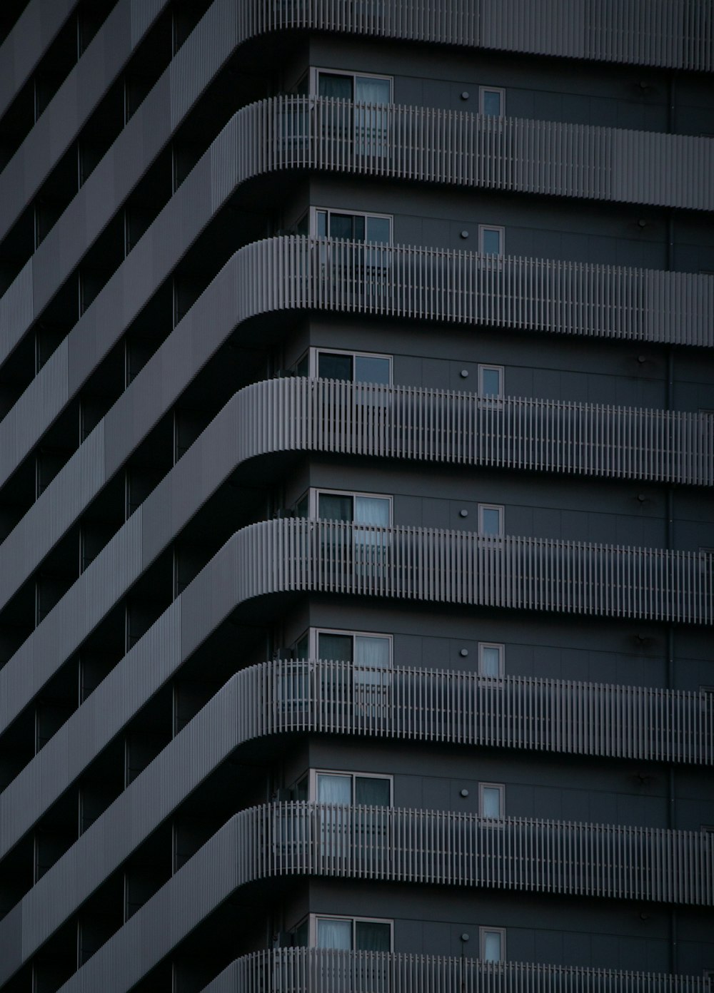 a very tall building with balconies and balconies