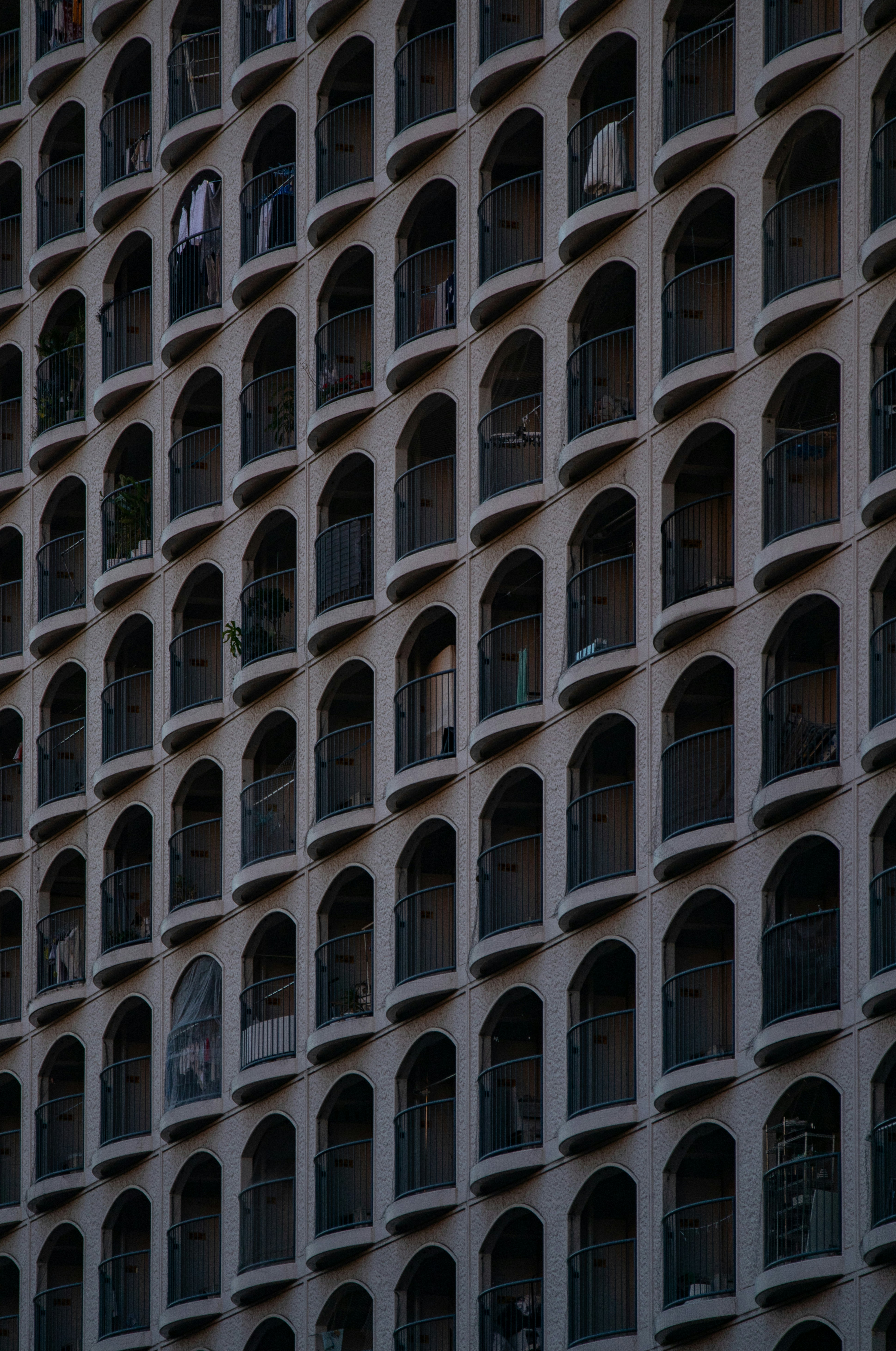 a large building with many windows and balconies