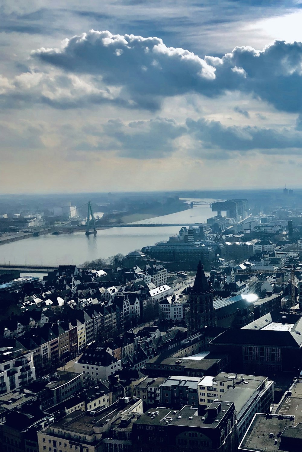 an aerial view of a city with a river running through it