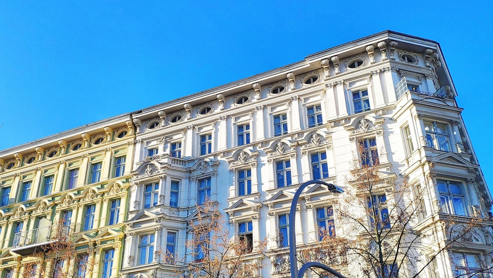 a tall building with a clock on the front of it