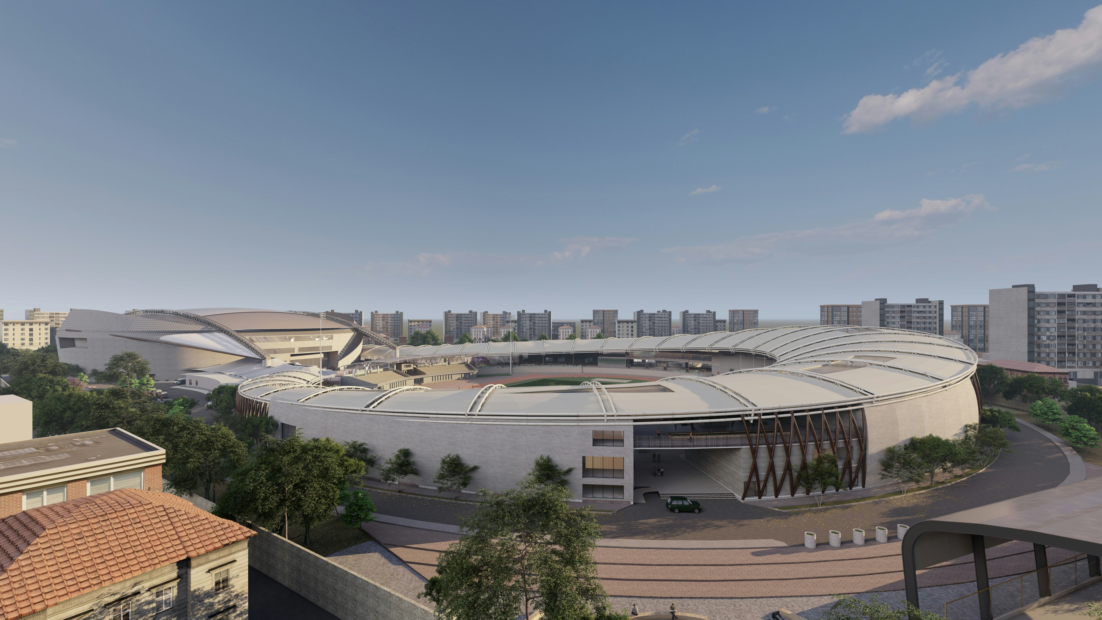 an aerial view of a building with a circular roof
