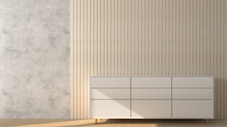 Modern minimalist room accented by a sleek, neutral-toned carpet from our collection.