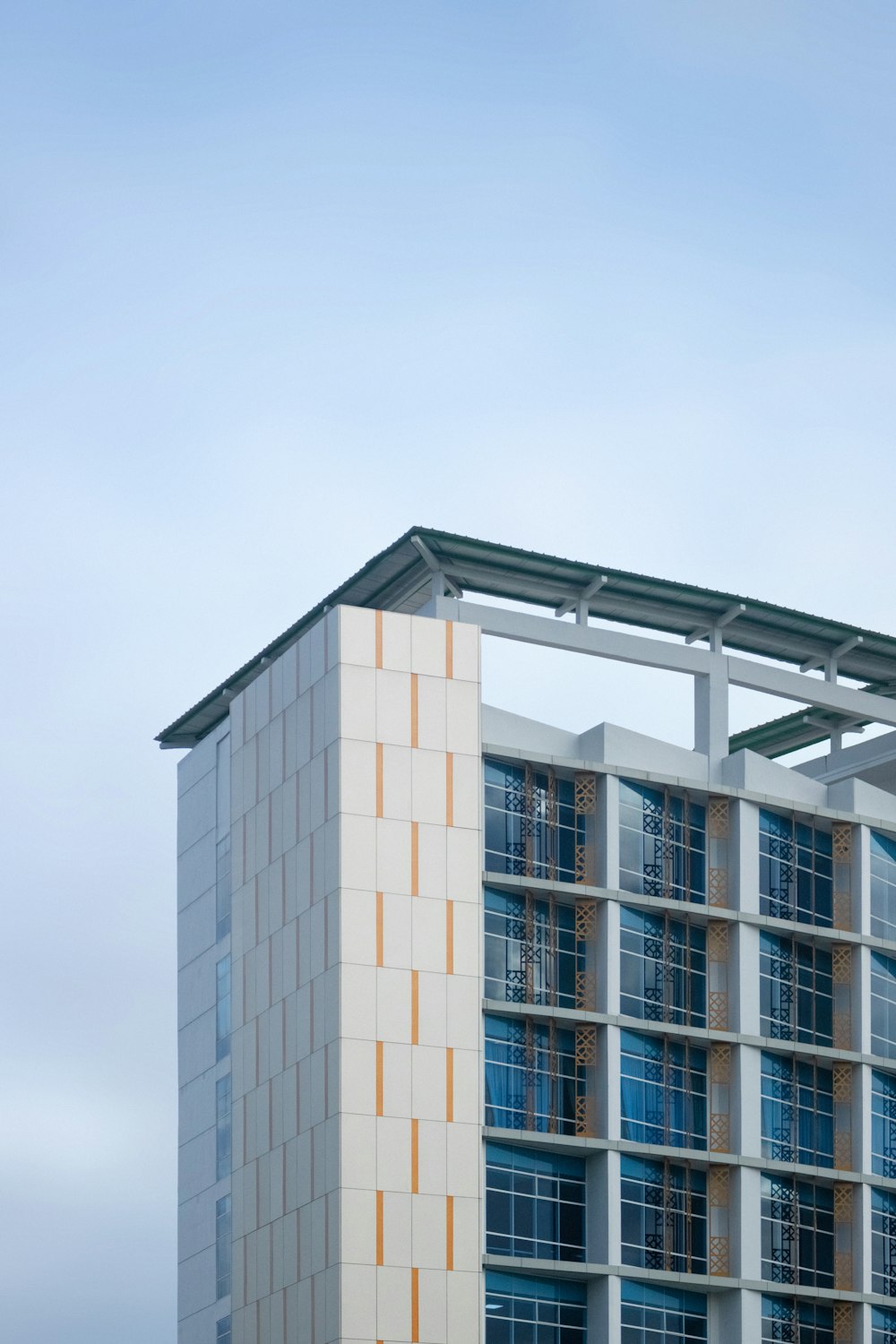 a tall building with a clock on the side of it