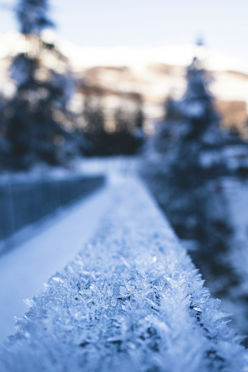 a close up of a snow covered sidewalk