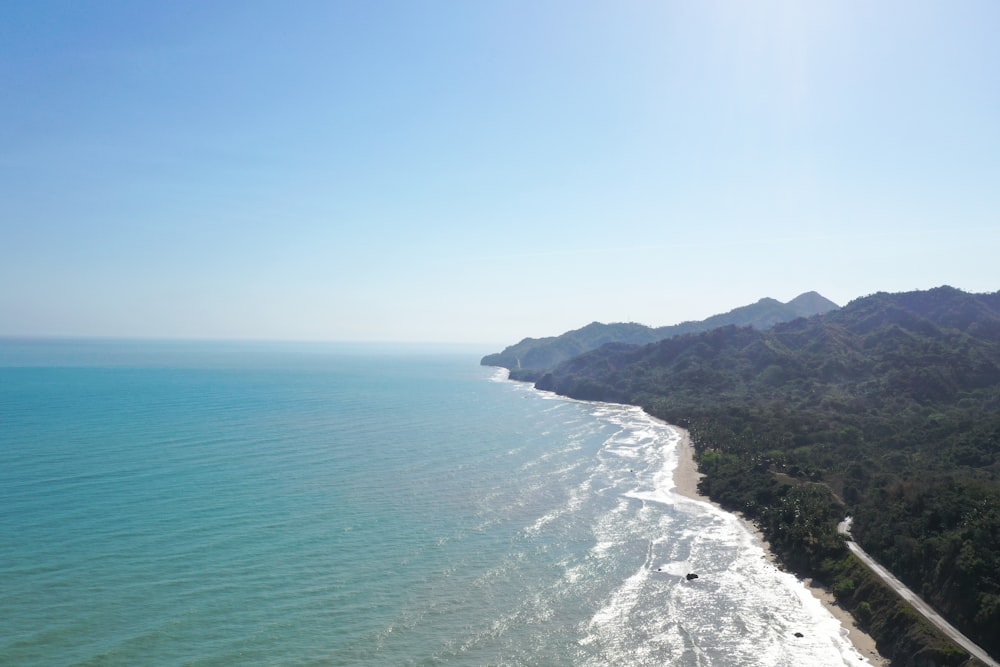 an aerial view of a beach and a body of water