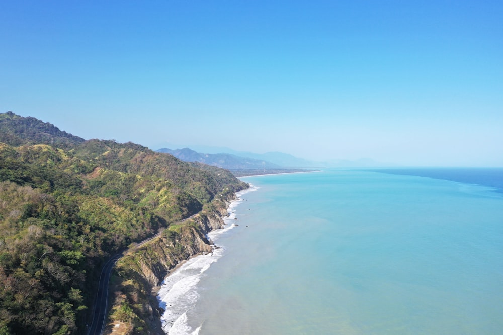 an aerial view of a beach and a body of water