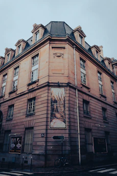 a large building with a clock on the side of it