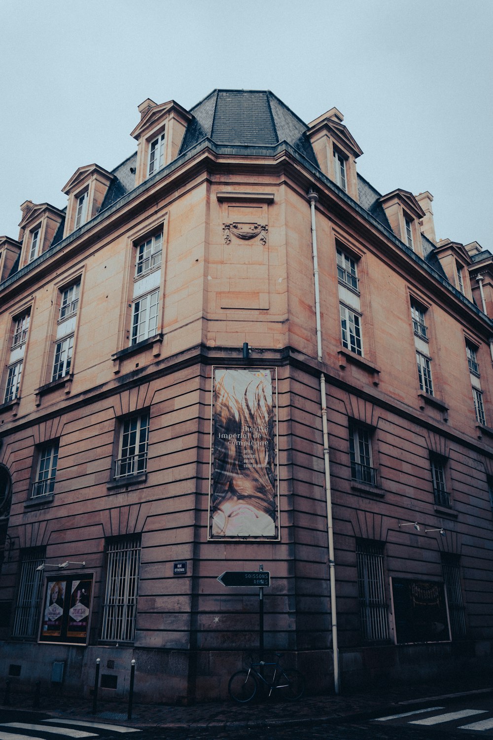 a large building with a clock on the side of it