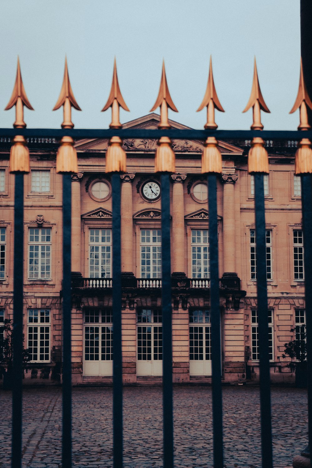 a large building with a clock on the front of it