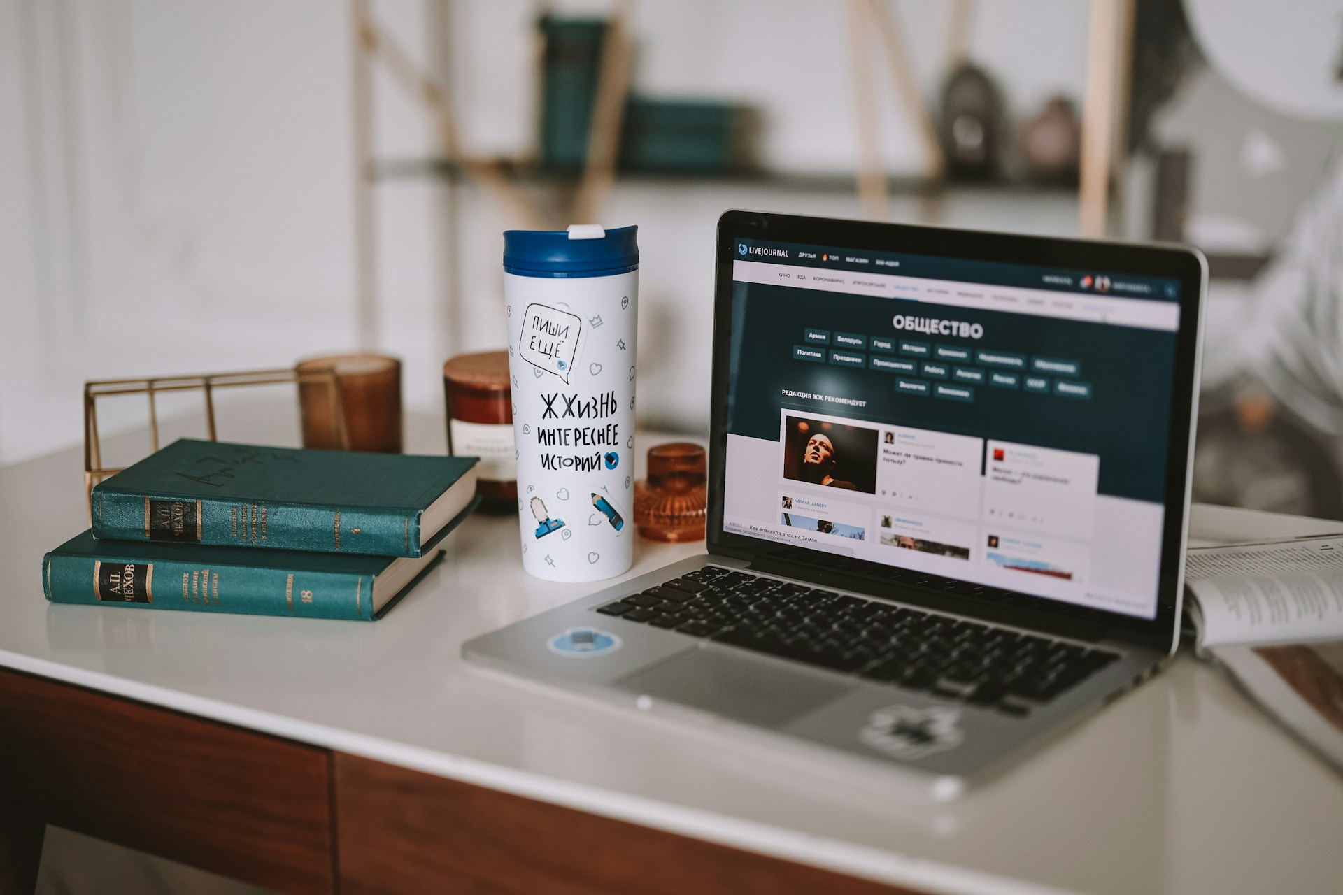 a laptop computer sitting on top of a desk
