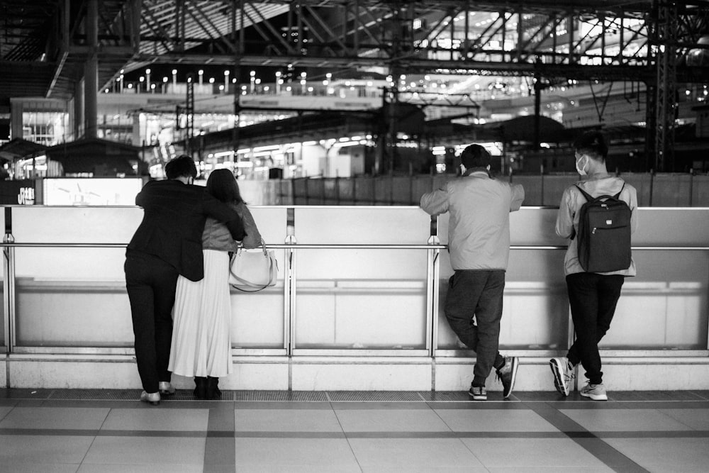 a group of people standing next to each other