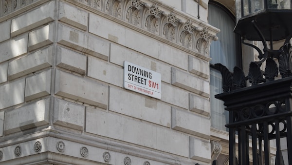 a street sign on the side of a building