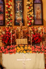 Volunteers arranging flowers and candles for the altar.