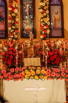Volunteers arranging flowers and candles for the altar.