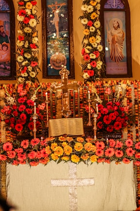 A vibrant church altar decorated with flowers and candles.