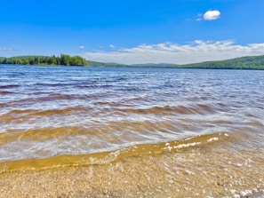 A scenic view of Lakey Peak's waves and coastline.