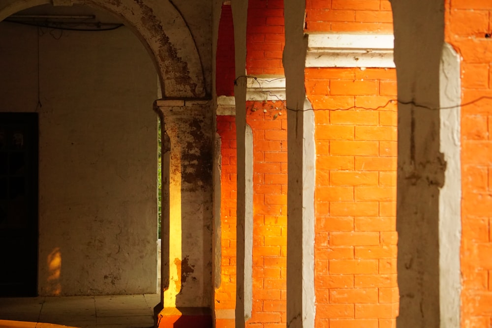 a row of arches in a brick building