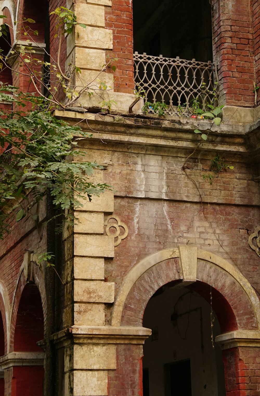 an old building with a clock on the front of it