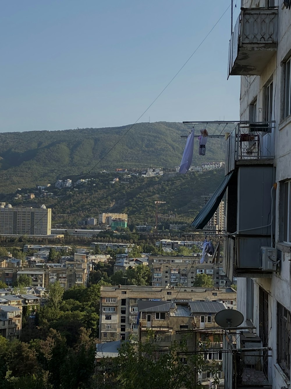 a view of a city with mountains in the background