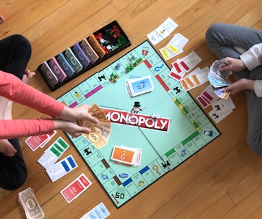 mom and son playing monopoly