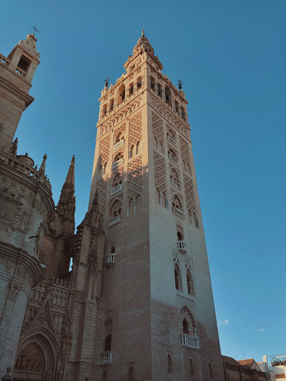 a tall tower with a clock on the top of it