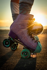 a person riding a skateboard on a road
