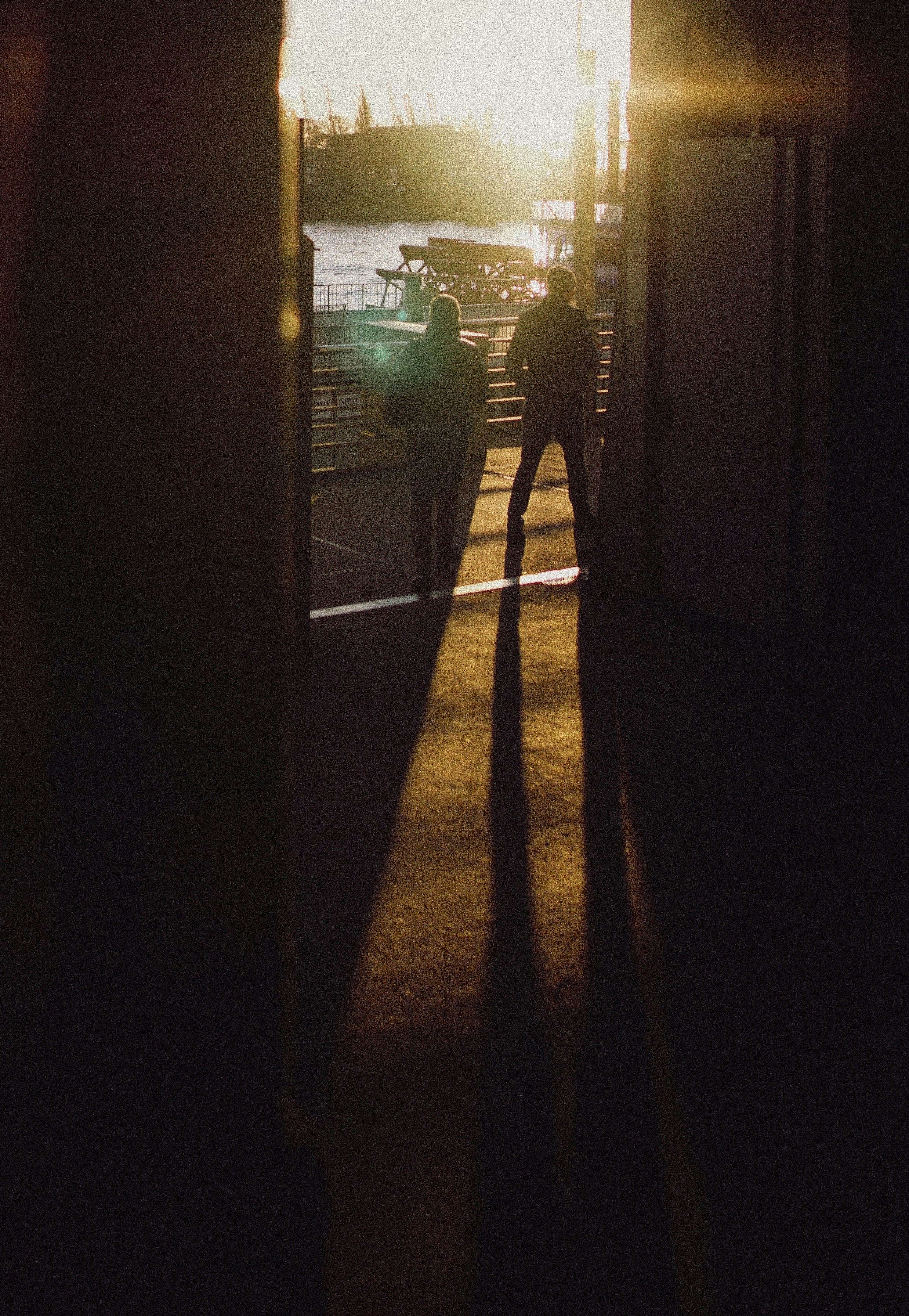 a couple of people standing next to each other