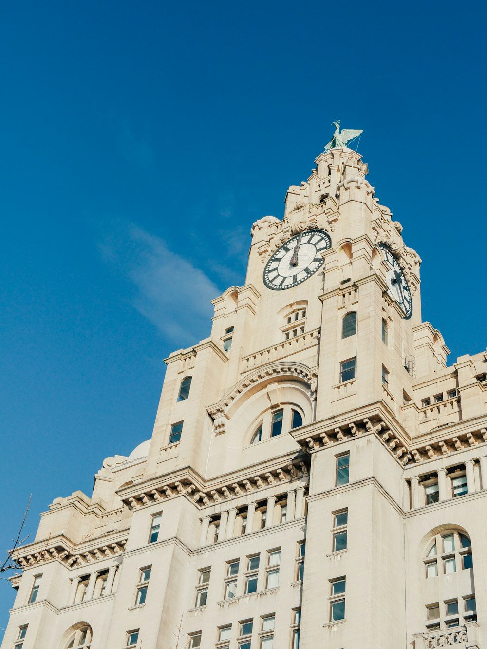 a large building with a clock on the top of it