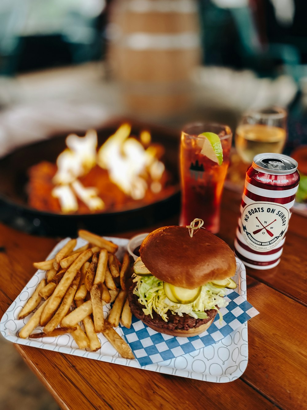 a hamburger and french fries on a table