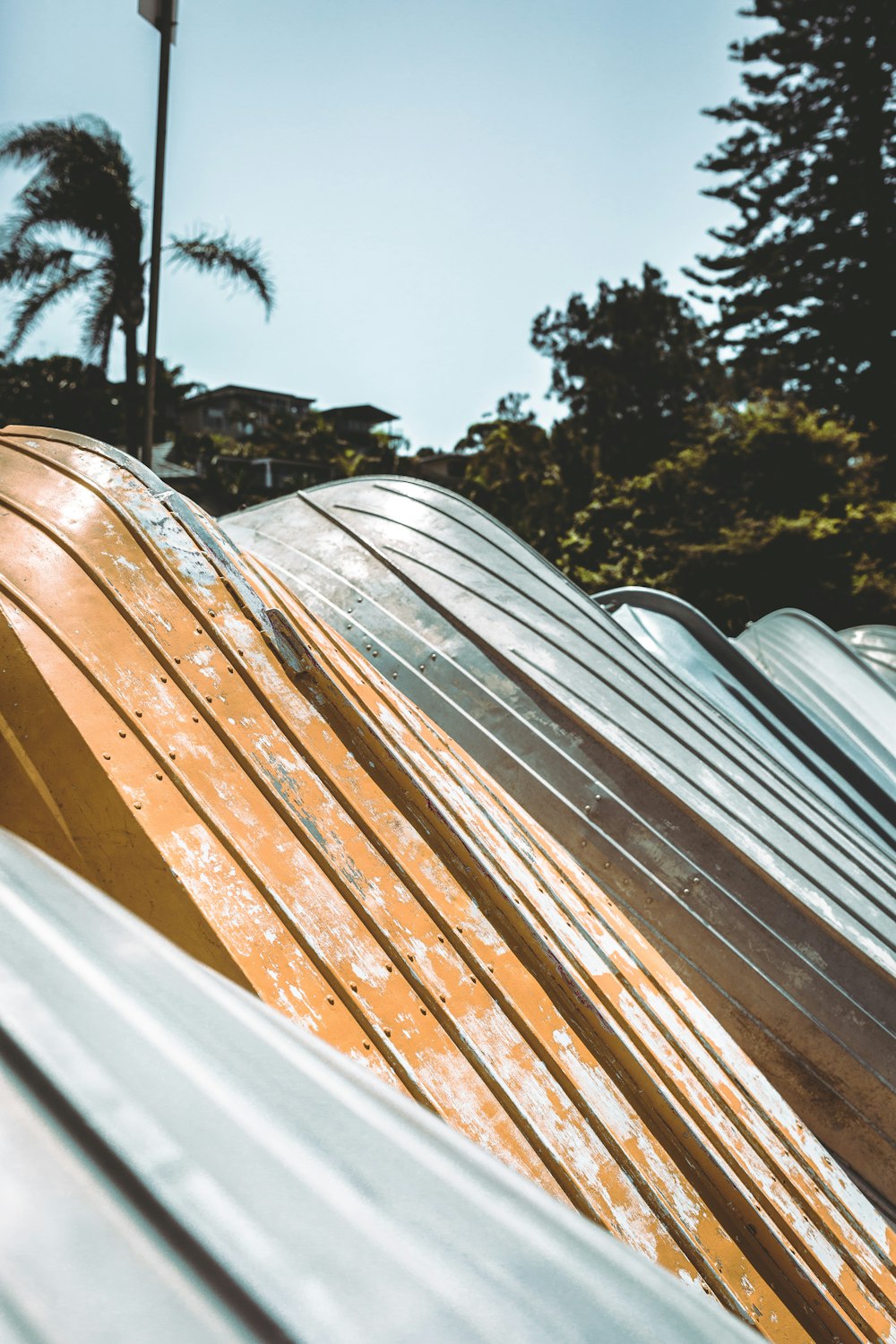 a row of surfboards sitting next to each other