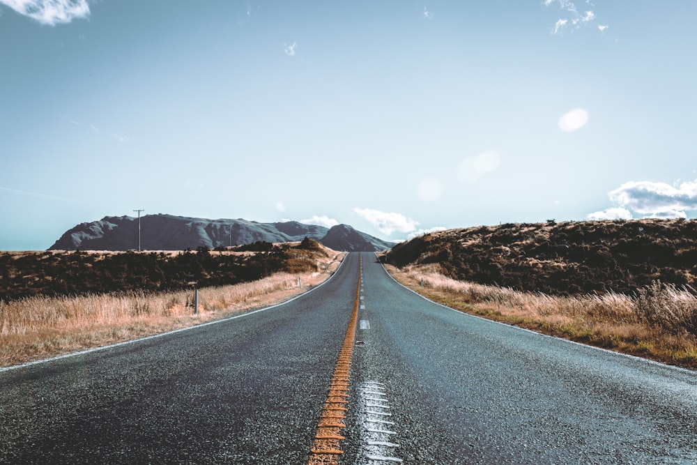 an empty road in the middle of nowhere